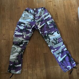 Purple, white, grey and black camo print cargo pants.